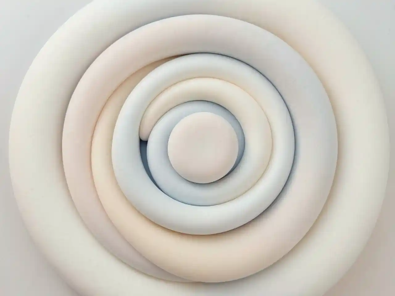 Concentric soft shapes suggesting a quiet centred pause